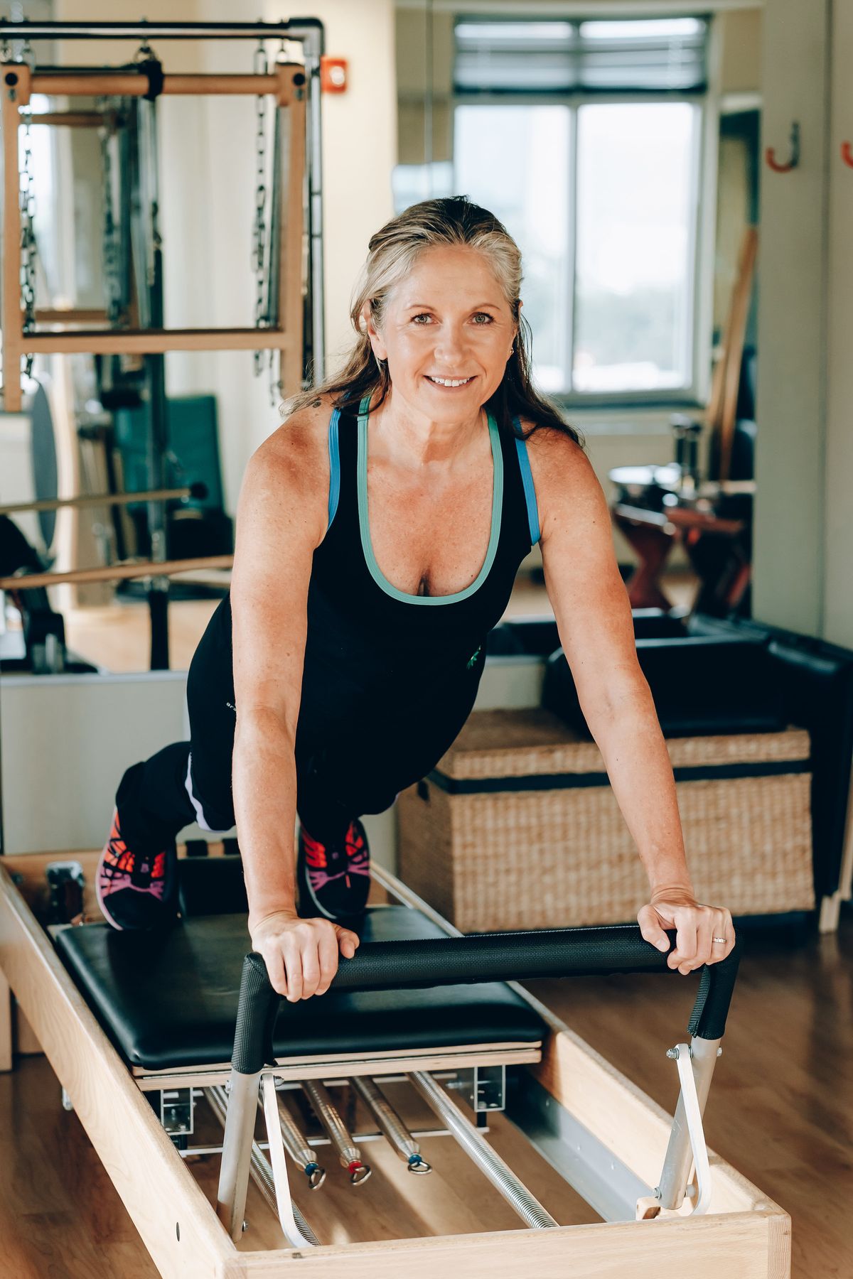 Pessoa praticando Pilates